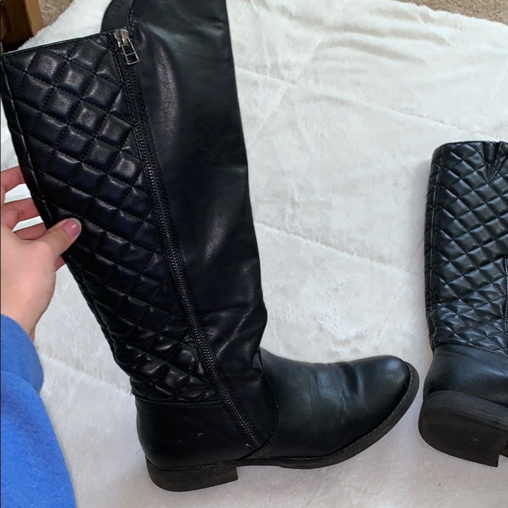 Tall black boots